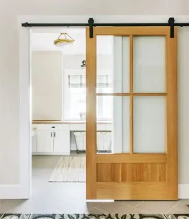 wooden barn door with glass